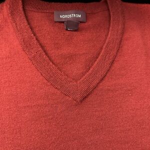 Men’s red v-neck sweater